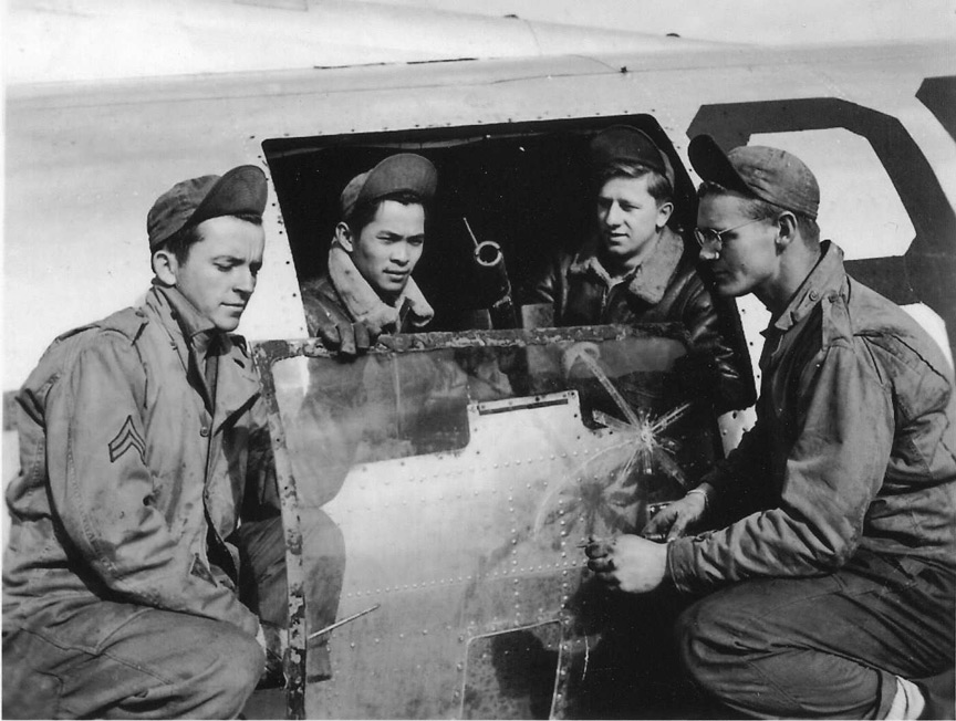 Frederick J. Lang and Colleagues Installing Waist Gunner Plexiglass - 601st Squadron - 1944